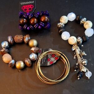 NEW WOMEN'S BRACELETS  LOT OF 4-  One Size Fits All... BLING BLING